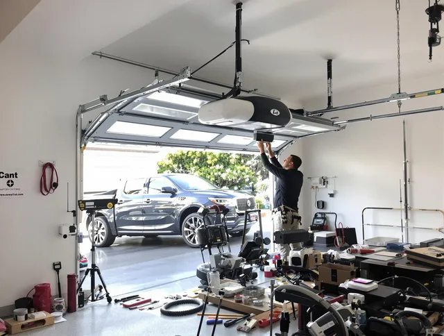 Cleveland Garage Door Repair specialist installing smart garage door opener system in Cleveland home